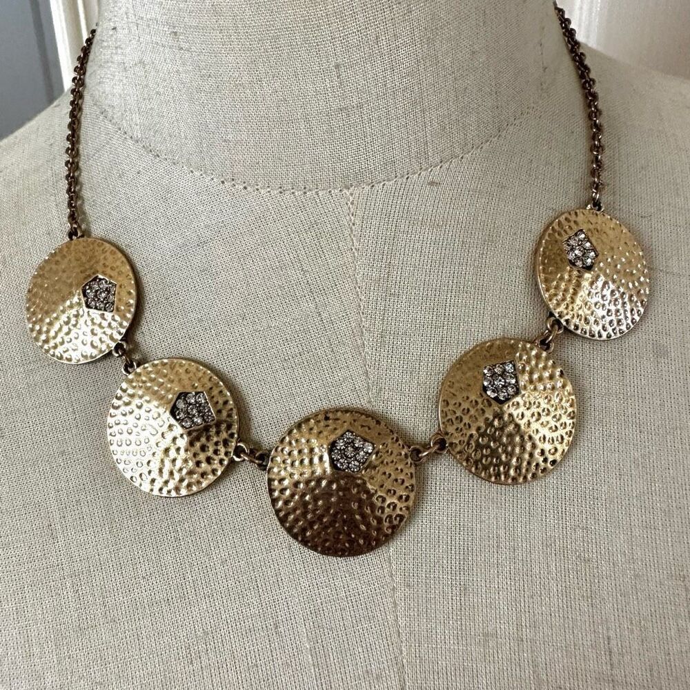 Gold tone rhinestone disc statement necklace